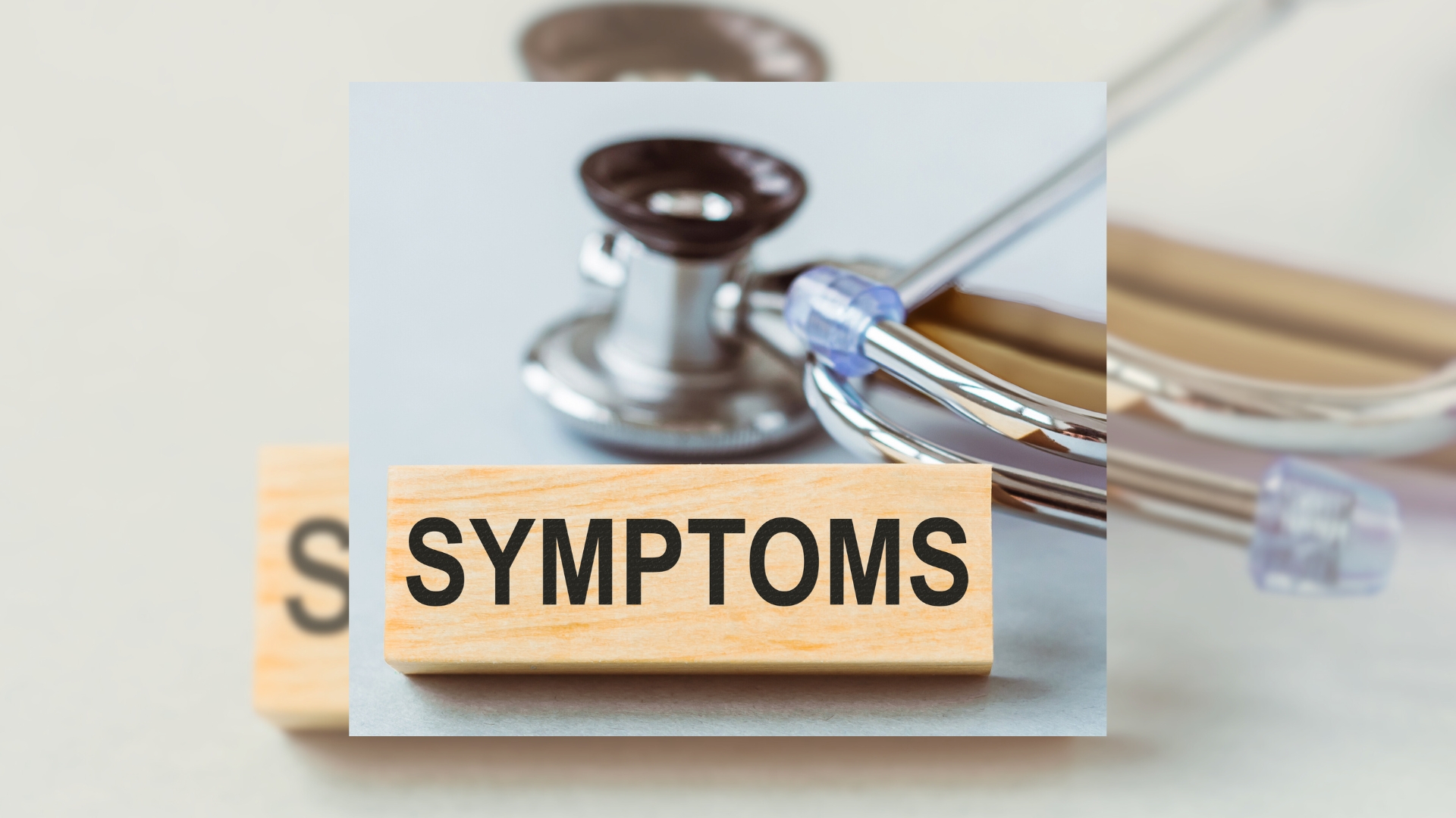 An image of a wooden block that spells out symptoms representing how do you know if you are infertile.